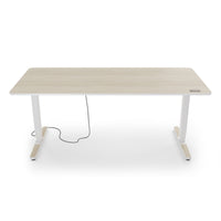 Desk Pro 2 in 180 x 80 cm mit Akazie Tischplatte und Display zur Höhenverstellung.